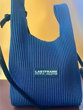 LASTFRAME metallic blue ribbed Crossbody Bag with Black Strap